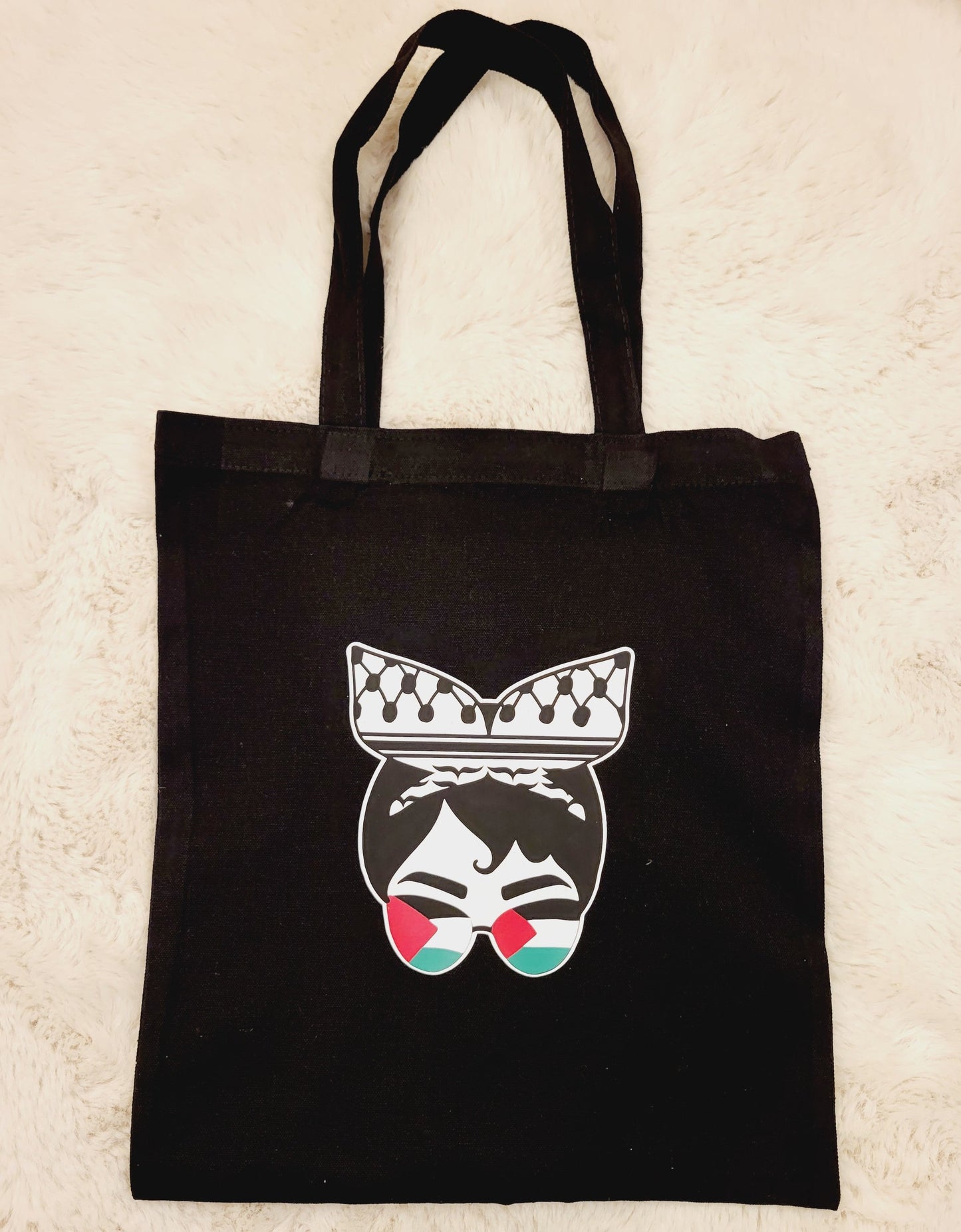 Free Palestine black cotton tote/bag. Show solidarity with Palestinians by displaying their national symbols - keffiyeh, watermelon and the Palestine flag. We work hard to provide you with unique and customised items.