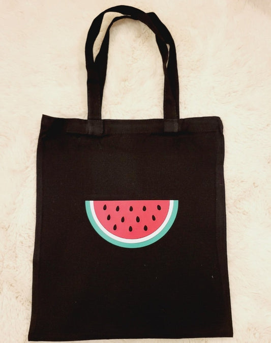 Free Palestine black cotton tote/bag. Show solidarity with Palestinians by displaying their national symbols - keffiyeh, watermelon and the Palestine flag. We work hard to provide you with unique and customised items.